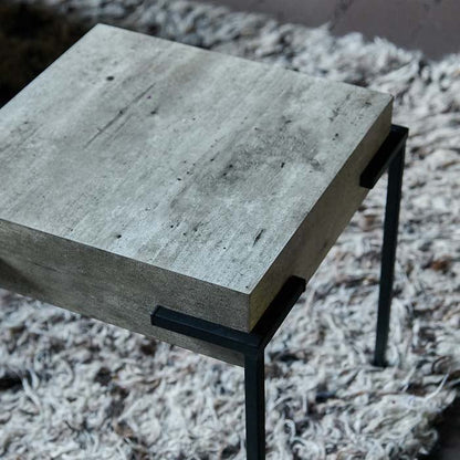 Faux concrete finish on small square side table.