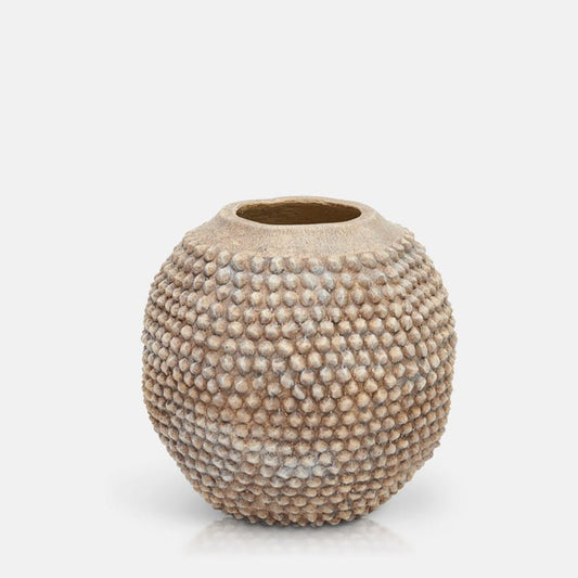 Round cement vase with spiky bobble texture and rustic finish.