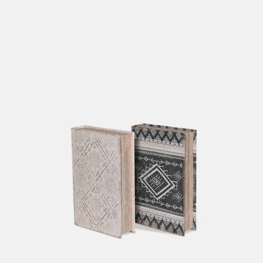 Grey patterned storage book behind a cream patterned storage book