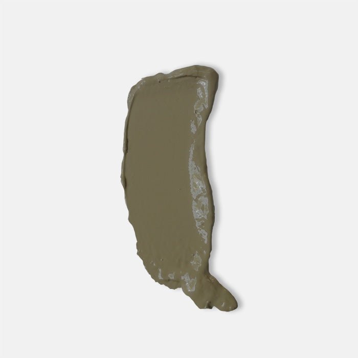 A smear of a mid tone brown paint