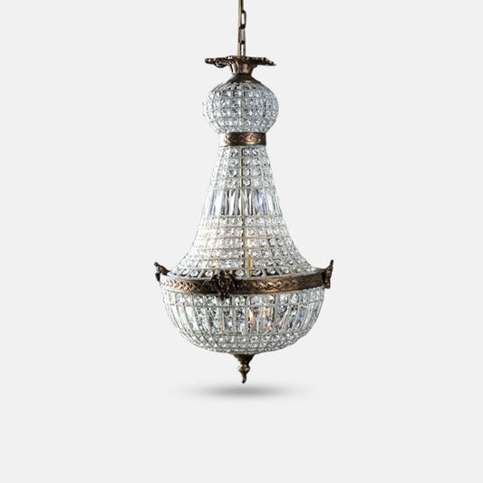 Small ballroom chandelier with bronze metal frame and clear glass beads.