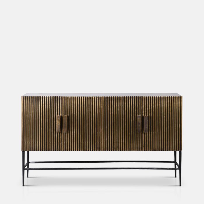 Long ribbed gold sideboard on a black metal frame