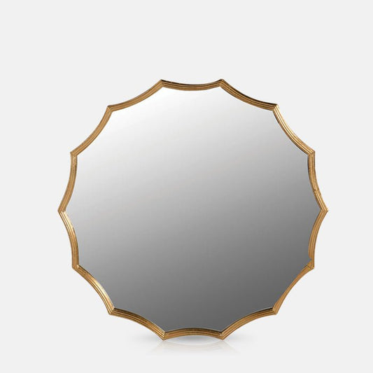 Large round gold framed mirror with star shaped edging