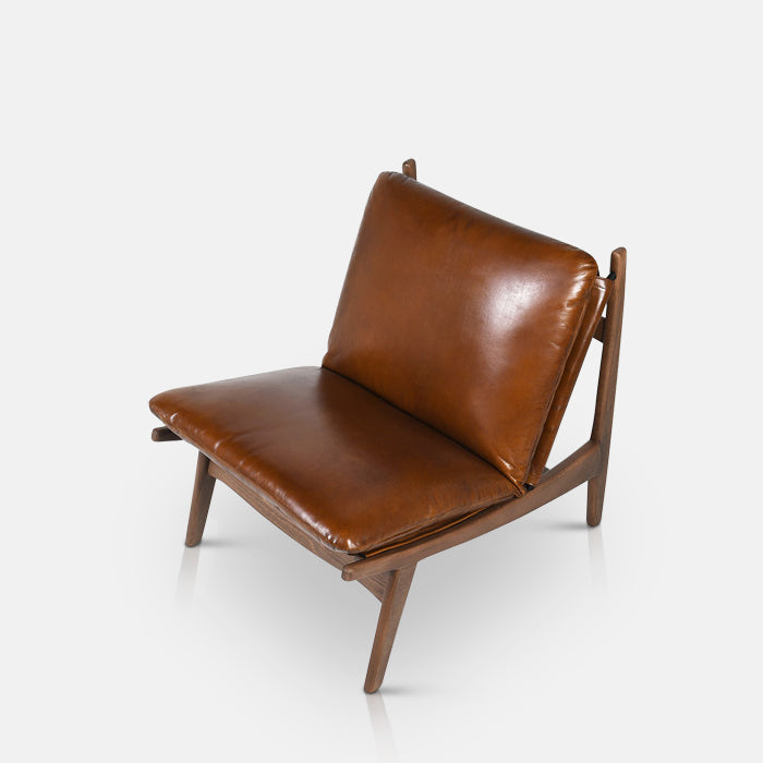 Dark brown leather armchair on a simple wooden frame