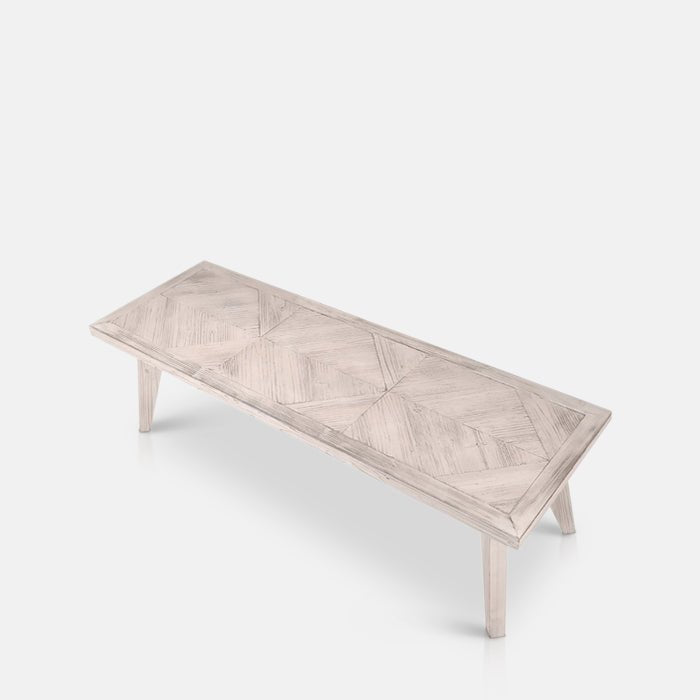  A top cutout of the Bronson Parquet Bench. A herringbone wooden tiled patterned bench.