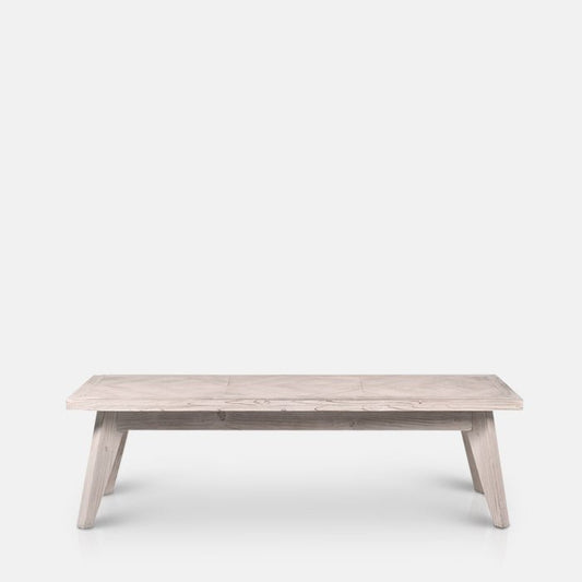 Long light wooden bench with a parquet top