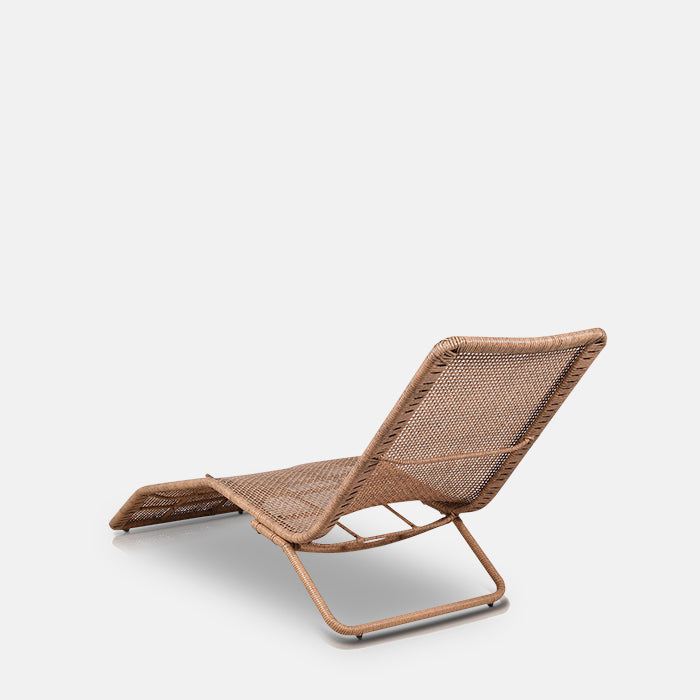 Curved back on a low slung sun lounger with brown framing