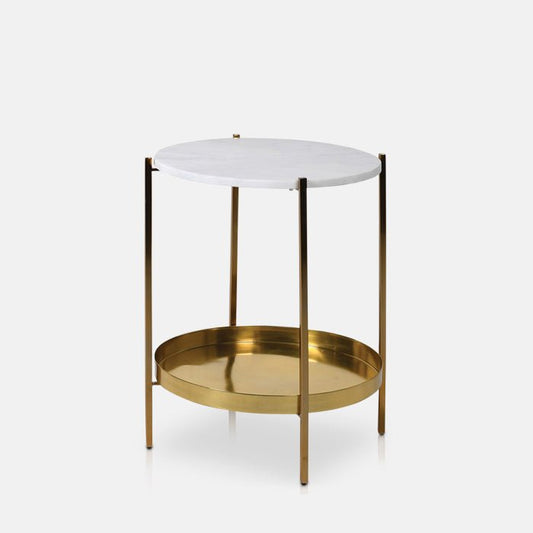 Round side table with white stone top and brass storage shelf and legs.