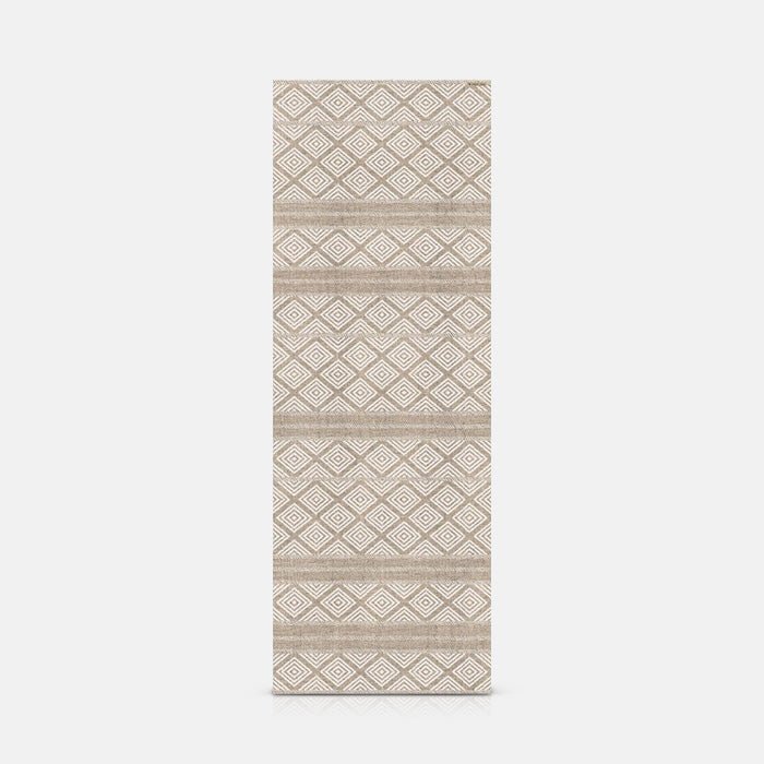 A cutout of the Canta Vinyl Flooring, a diamond and striped pattern vinyl runner in a beige and light brown hue.