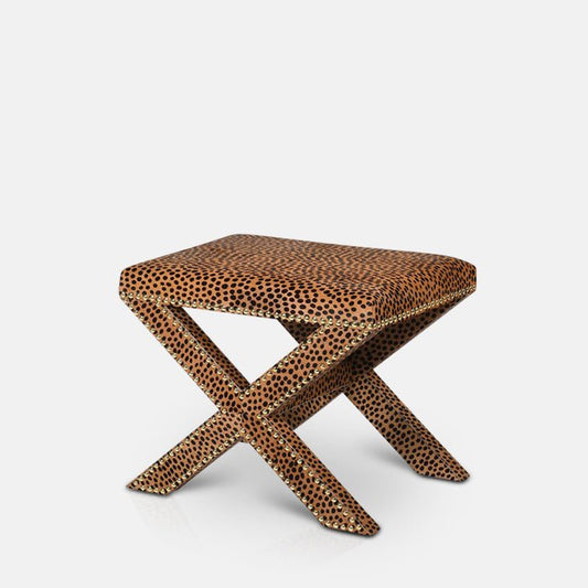 Brown leopard print stool with gold studs along its edges
