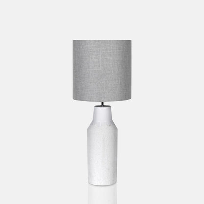 Textured cream table lamp with a round cream lampshade