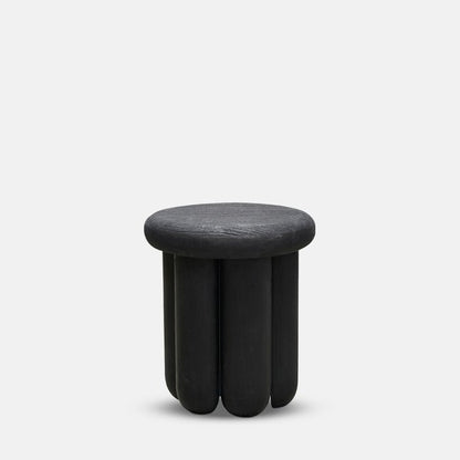 Round black wooden side table with curved sculpted leg design.