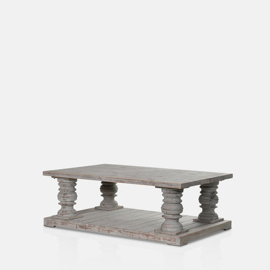 Distressed grey wooden coffee table with two tiers and pedestal legs