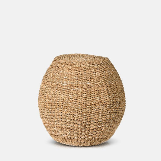 Tall woven seagrass stool in a round shape