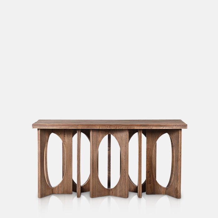 Cutout of the Epping Console Table, a slim rectangular table in recalimed elm with an elaborate circular cutout shaped base.