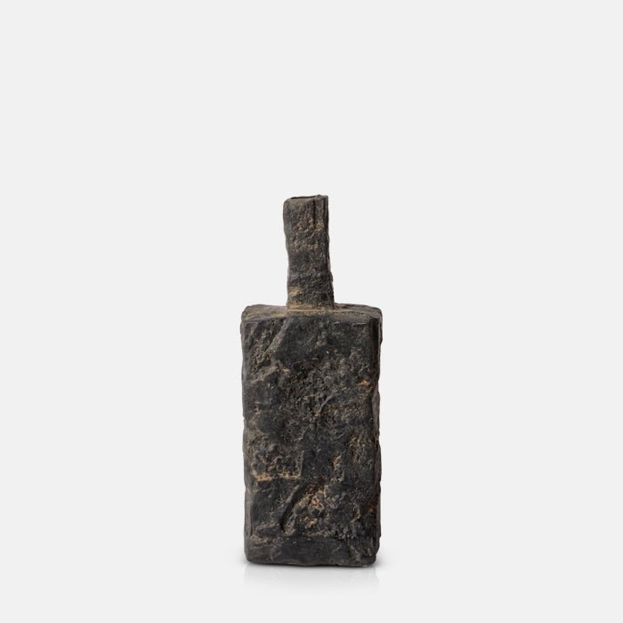 Angular bottle porcelain vase in black with a rough textural finish. 