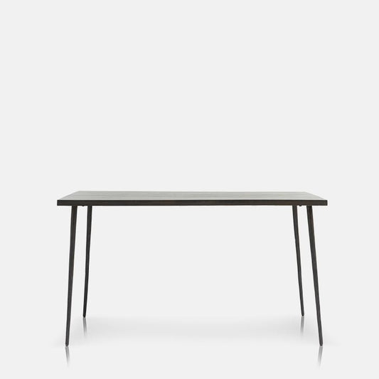 Rectangular black wooden dining table with four metal legs.