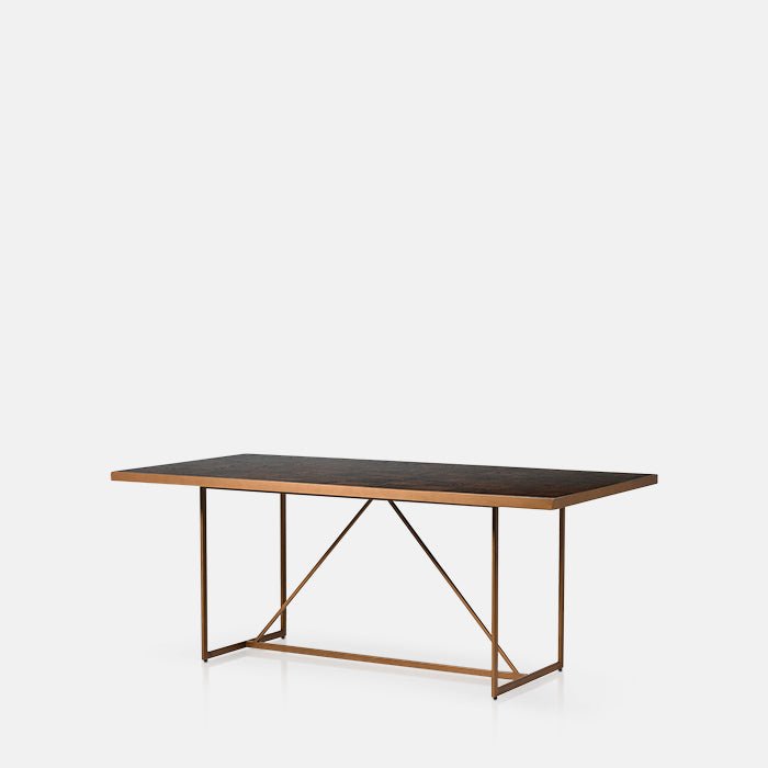 Rectangular dining table with a wooden top and gold metal frame