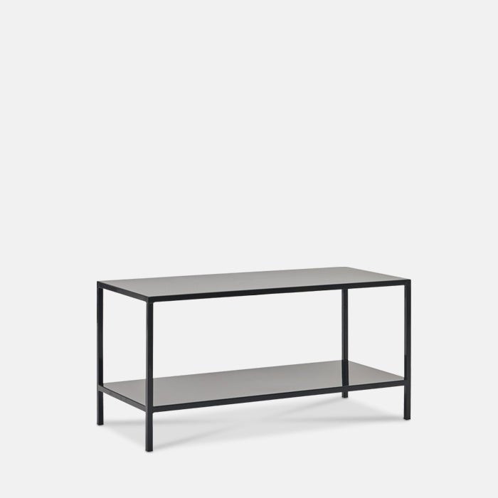 Rectangular metal side table with lower storage shelf.
