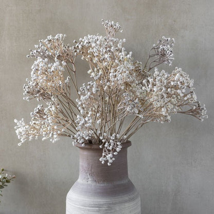 Image of luxury artificial Gypsophila with delicate white flower buds. A stunning fake flower addition to any home, these floral bouquets look stunning in our vases with their realistic appearance.