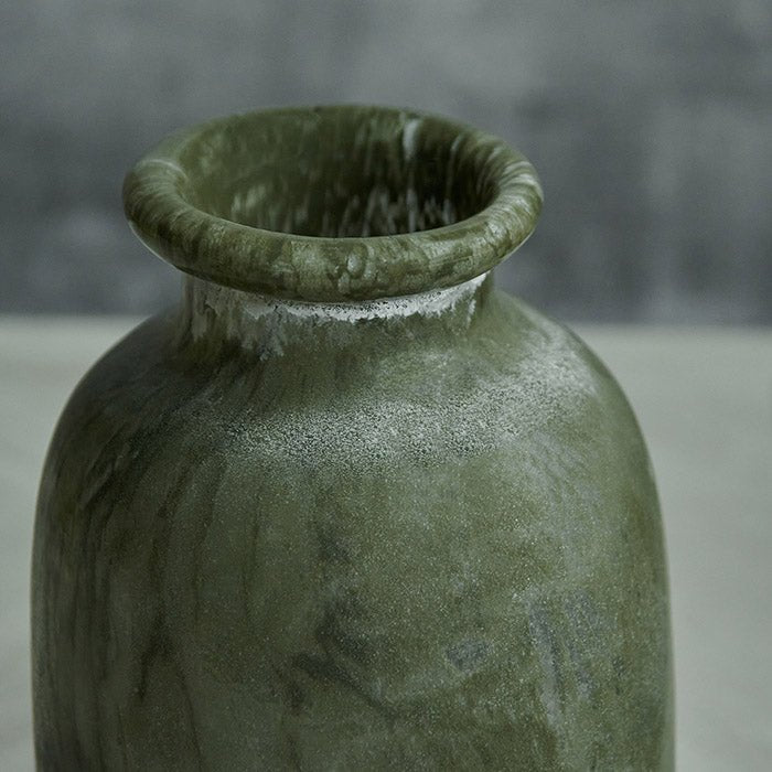 Frosted green glass bottle vase with white details