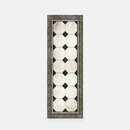 Black and white tiled pattern with a decorative edge on a long vinyl runner