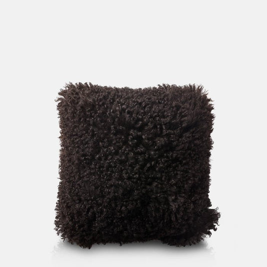 Shaggy black sheepskin cushion in a square shape