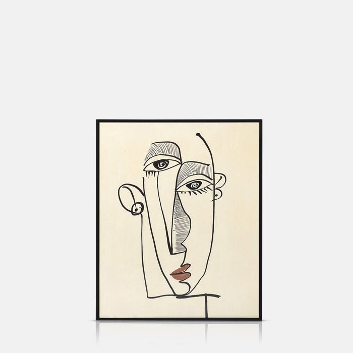 Picasso style face print on cream paper placed in a thin black frame