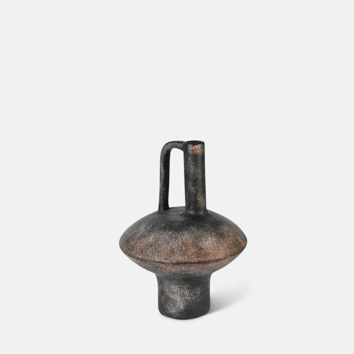 A cutout of the Lovina Vase, a modernist sculptural terracotta vase with a narrow neck in a dark grey matte rustic finish.