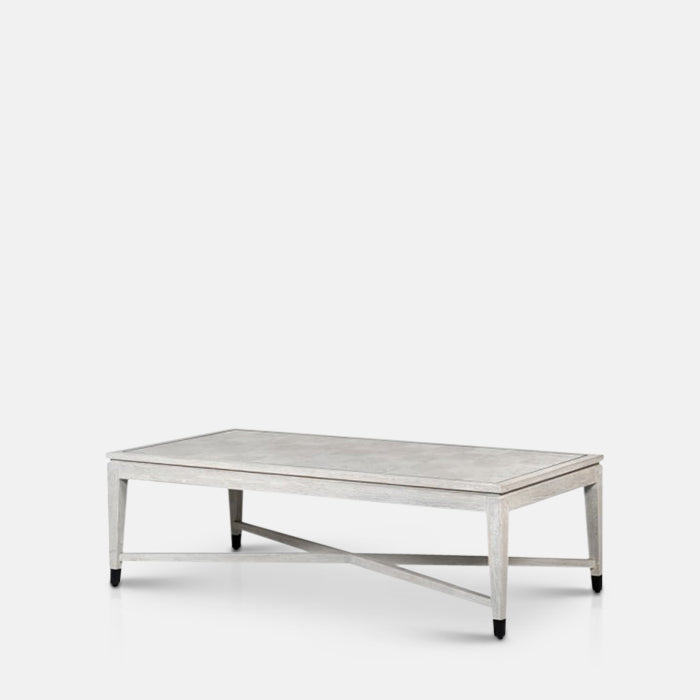 White rectangular wooden coffee table with a cross base