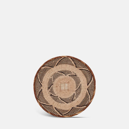 Round wall basket in dark brown and natural pattern.
