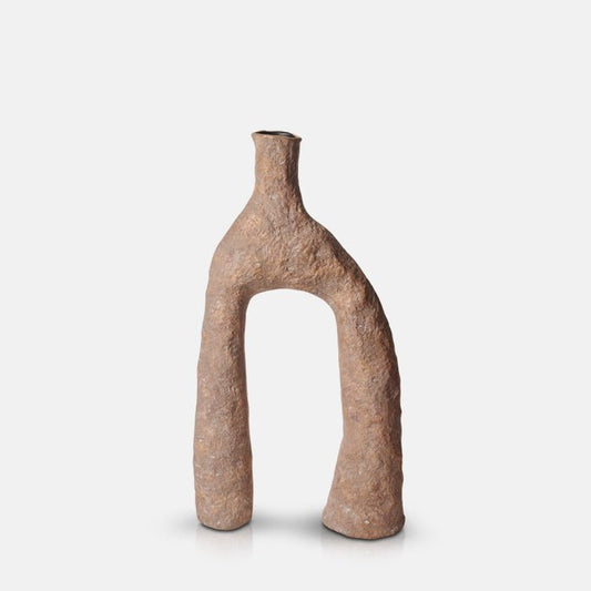 Tall arched sculptural vase in a terracotta hue