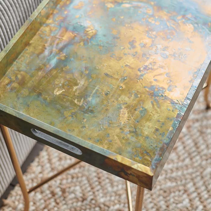 Antique style gold metallic patina on rectangular side table.