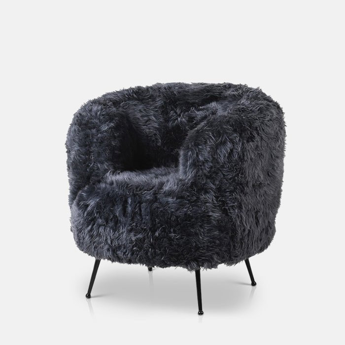Abigail Ahern Oslo Occasional Chair in soft, textural slate-coloured lambswool, featuring a contemporary upholstered seat and backrest with slim metal legs. A stylish statement accent chair that brings warmth, texture and character to modern, eclectic interiors, ideal for a living room, bedroom or home office.