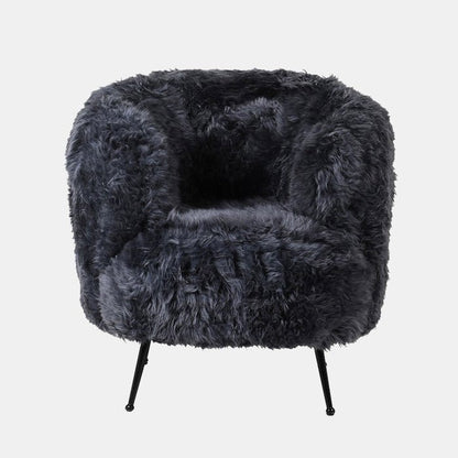Fluffy chair in a grey shade with slim metal legs 