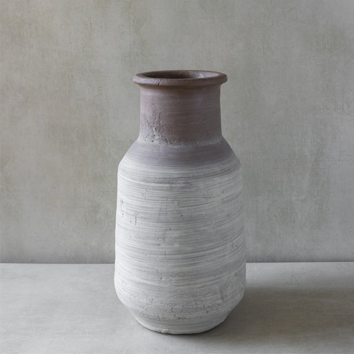 Image of an ombre grey and white stoneware vase, not styled with any fake flowers