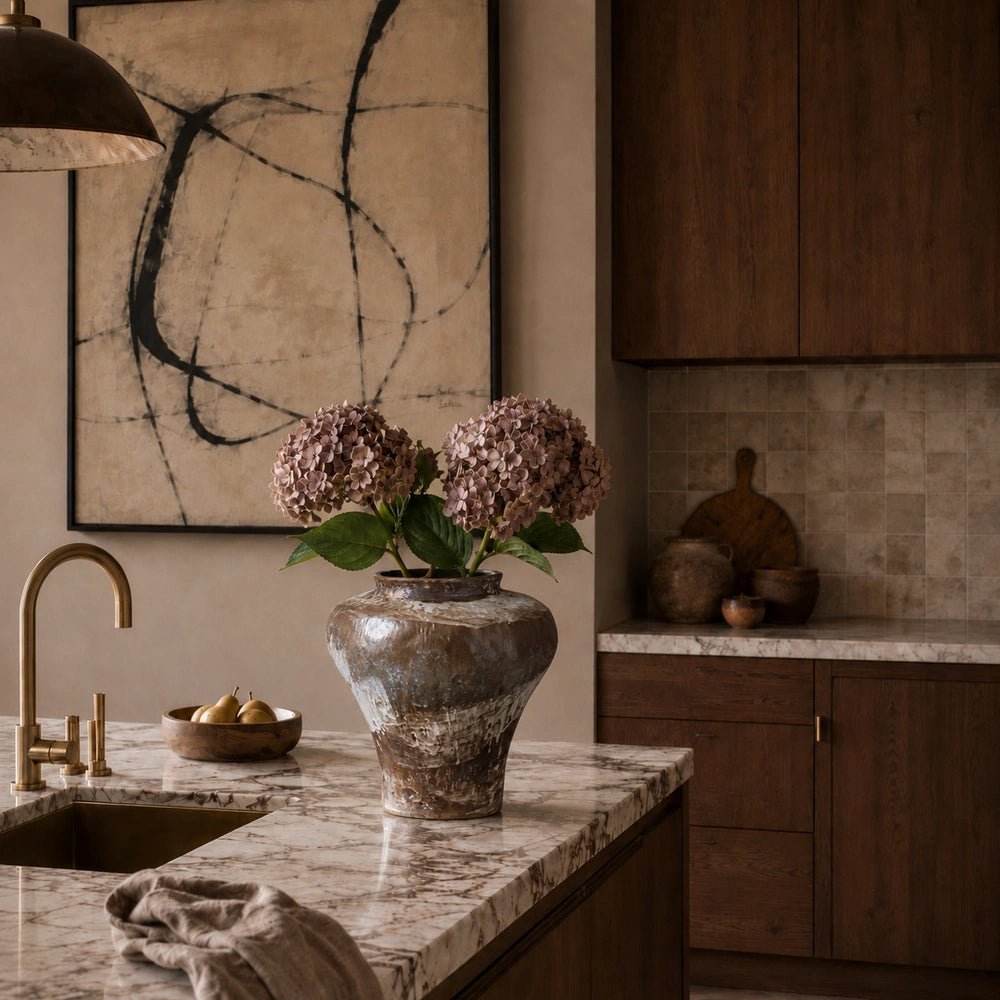 Close view of the Pedro Ceramic Vase showing its warm terracotta brown glaze, rounded body, irregular textured surface and bold handcrafted sculptural form.