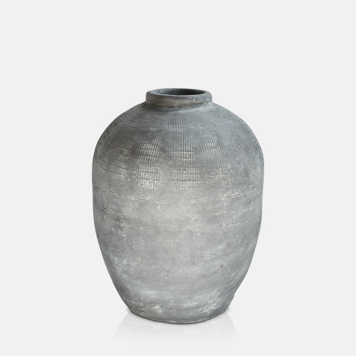Large grey cement vase with curved body and narrow neck, in rustic textured finish.