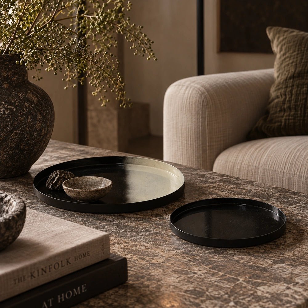 Purton Decorative Trays set of two displayed on a styled coffee table with neutral accessories, warm textures and contemporary decorative objects around them.