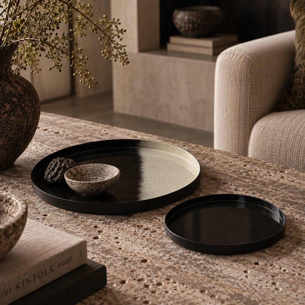 Purton Decorative Trays set of two styled on a coffee table with warm neutral accessories, sculptural objects and layered contemporary living room textures.