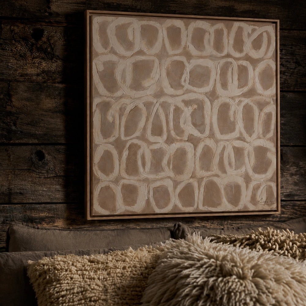 Ripple Canvas Art displayed in a warm living room setting with neutral furnishings, sculptural accessories and layered contemporary textures surrounding the artwork.