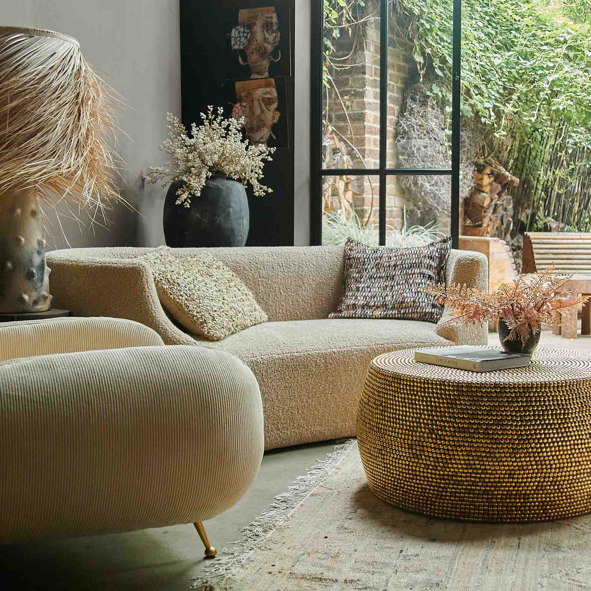 Samara curved sofa cream boucle two seater modern luxury living room Abigail Ahern furniture styled