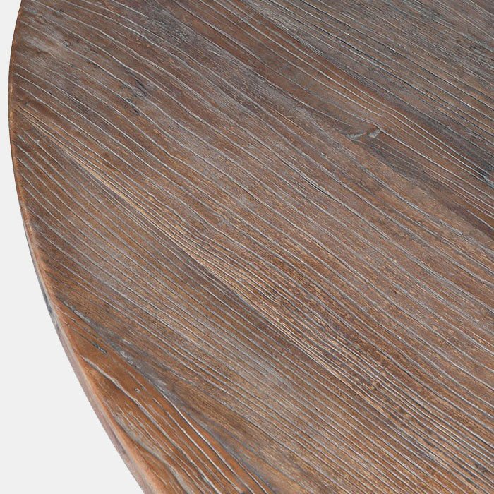 A closeup of the dark stained wooden finish on the Sonoma Dining Table.