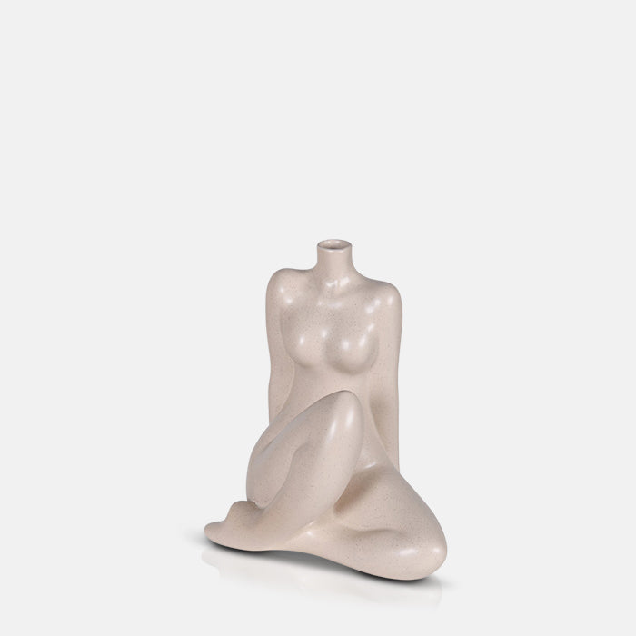 Sitting female figure vase in white porcelain 