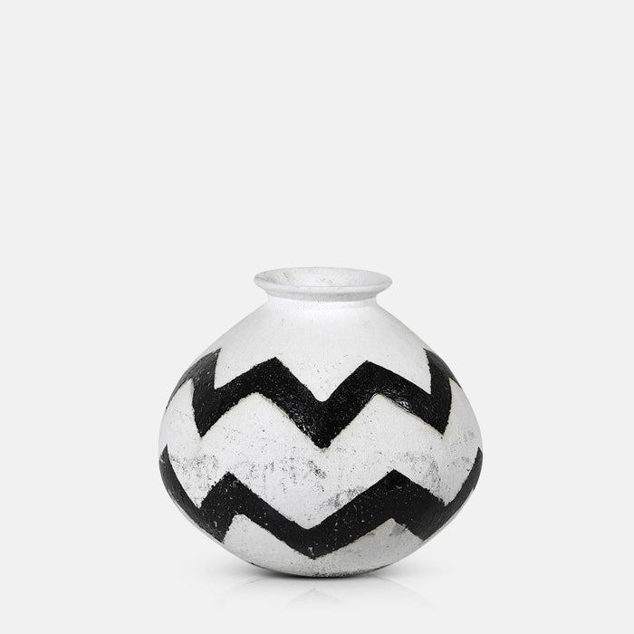 Black and white zig zag patterned round vase
