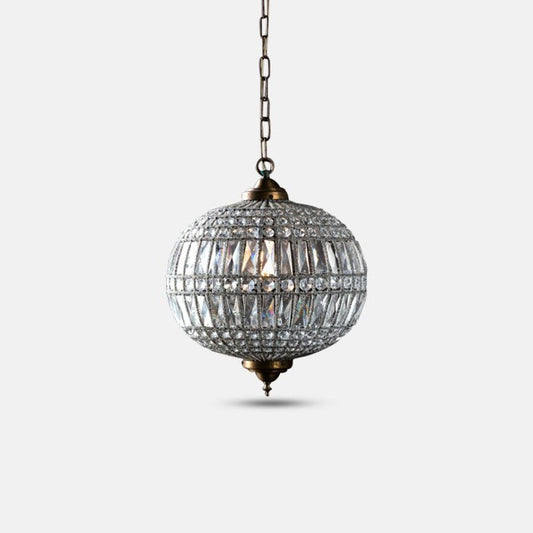 Medium round glass beaded chandelier with bronze detailing.