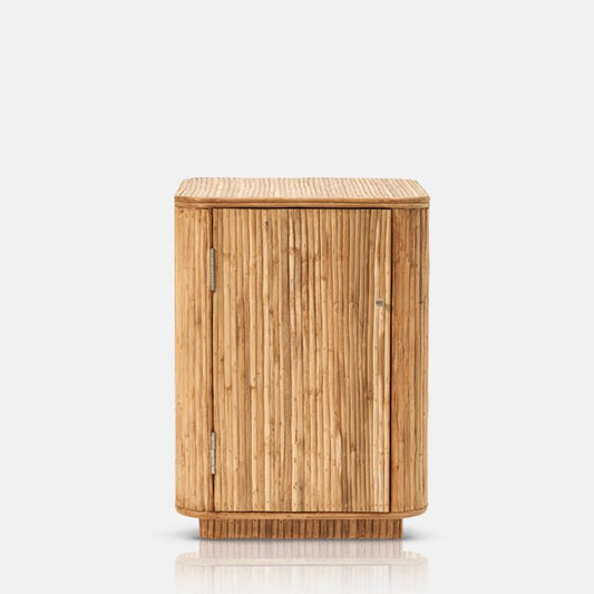 Natural rattan side table cabinet with cupboard for storage.