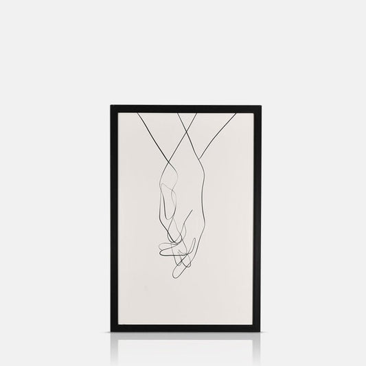 Black line drawing on a white background of two hands holding eachother in a black frame