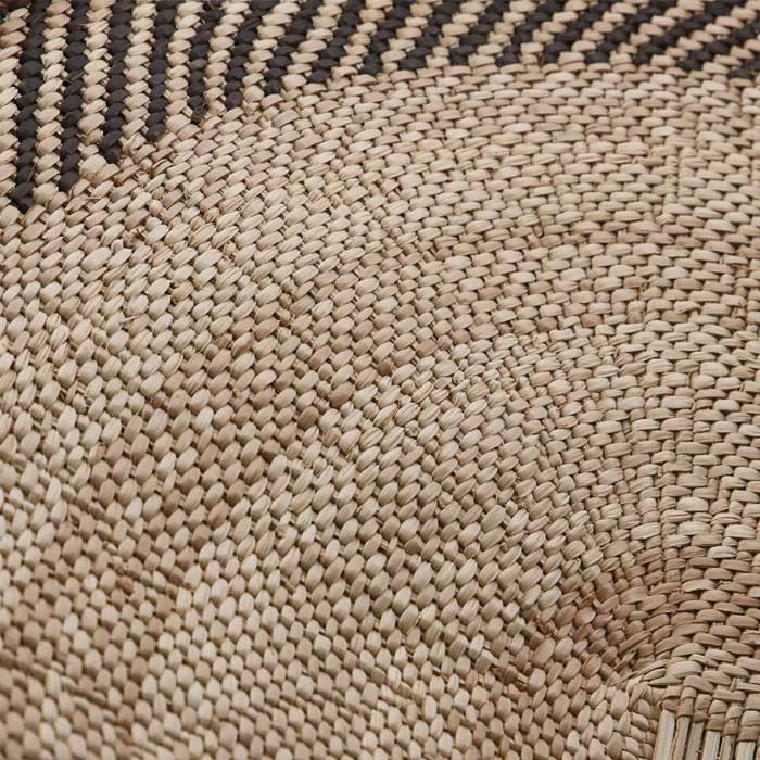 A closeup of the woven geometric tribal pattern on the Toledo Basket.
