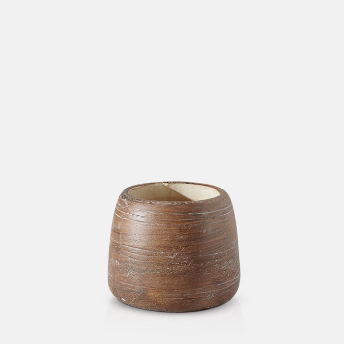 Large round brown vase with textured ribbed markings